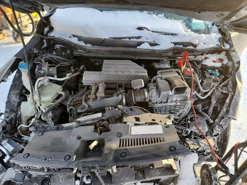 Photo 12 from auction – 2018 HONDA CR-V EX with VIN 7FARW2H54JE022494