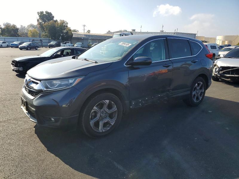 HONDA CR-V 2018 with VIN 7FARW1H59JE040208 - Photo from auction