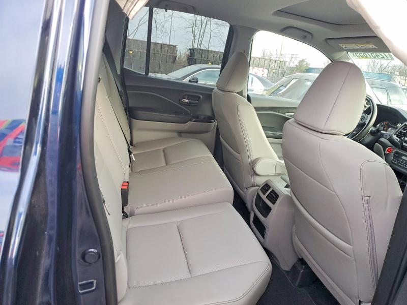 Photo 10 from auction – 2022 HONDA RIDGELINE with VIN 5FPYK3F72NB027252