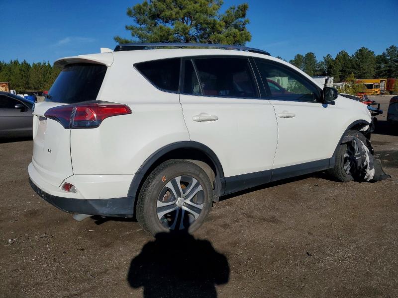 Photo 3 from auction – 2018 TOYOTA RAV4 LE with VIN JTMZFREV0JJ201570
