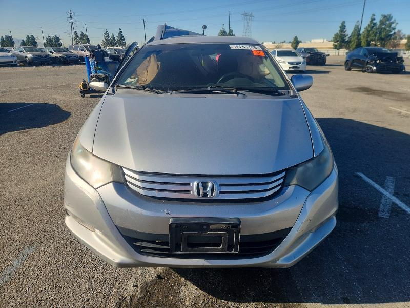 Photo 5 from auction – 2011 HONDA INSIGHT LX with VIN JHMZE2H57BS011491