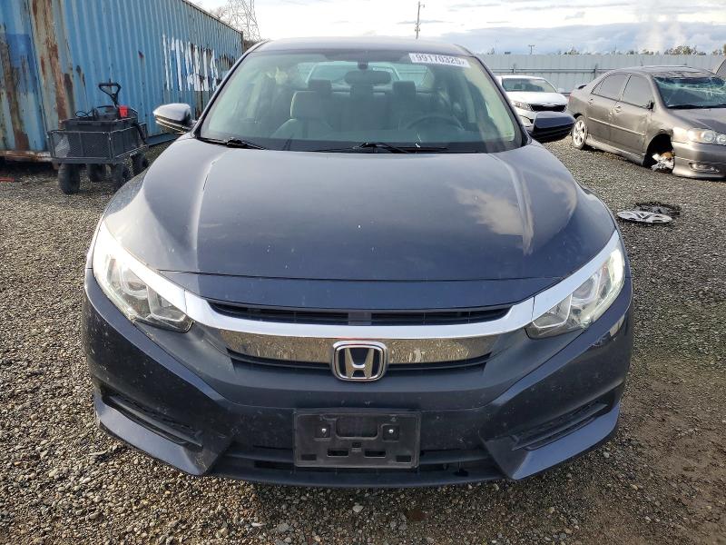 Photo 5 from auction – 2018 HONDA CIVIC LX with VIN 2HGFC2F57JH578093