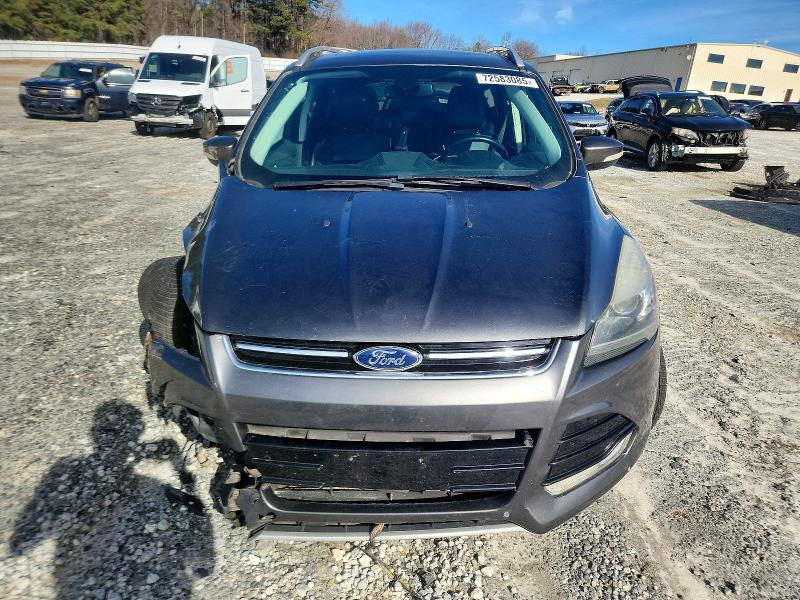 Photo 5 from auction – 2016 FORD ESCAPE TIT with VIN 1FMCU9J95GUA01341
