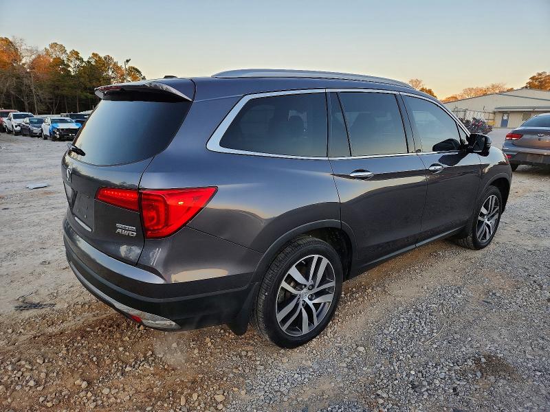 Photo 3 from auction – 2017 HONDA PILOT TOUR with VIN 5FNYF6H96HB068131