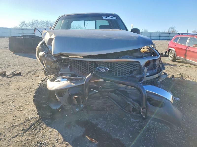 Photo 5 from auction – 2001 FORD F150 SUPER with VIN 1FTRW08L31KC64534