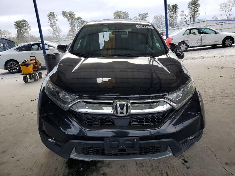 Photo 5 from auction – 2017 HONDA CR-V with VIN 7FARW1H87HE017563