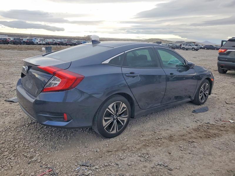 Photo 3 from auction – 2016 HONDA CIVIC with VIN 19XFC1F74GE016330