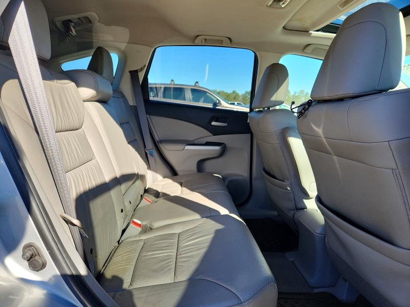 Photo 11 from auction – 2012 HONDA CR-V with VIN 2HKRM3H75CH502640