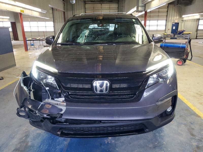 Photo 5 from auction – 2021 HONDA PILOT SE with VIN 5FNYF6H26MB043582
