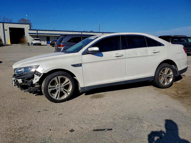 FORD TAURUS 2016 with VIN 1FAHP2E83GG129091 - Photo from auction