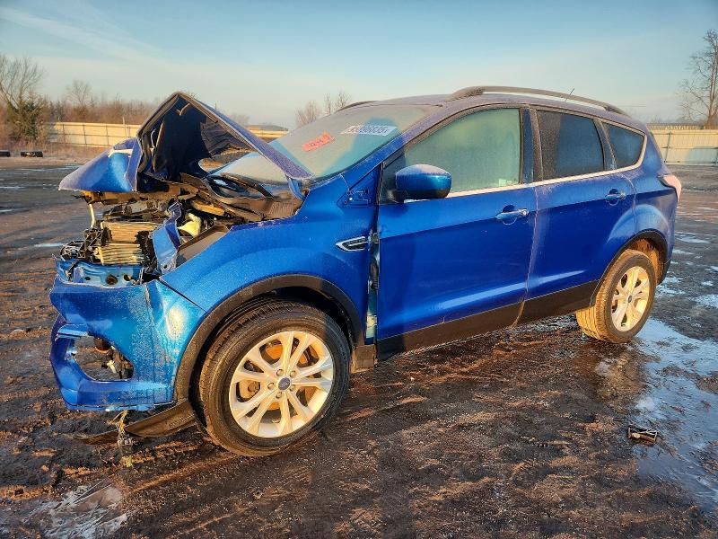 FORD ESCAPE 2018 with VIN 1FMCU0GD7JUB23696 - Photo from auction