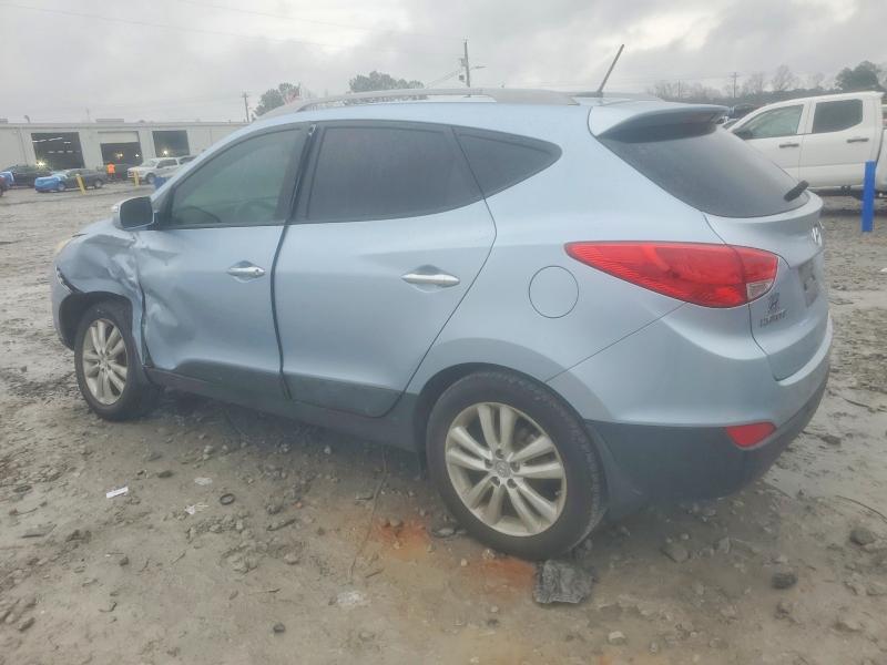 Photo 2 from auction – 2011 HYUNDAI TUCSON with VIN KM8JU3ACXBU297028