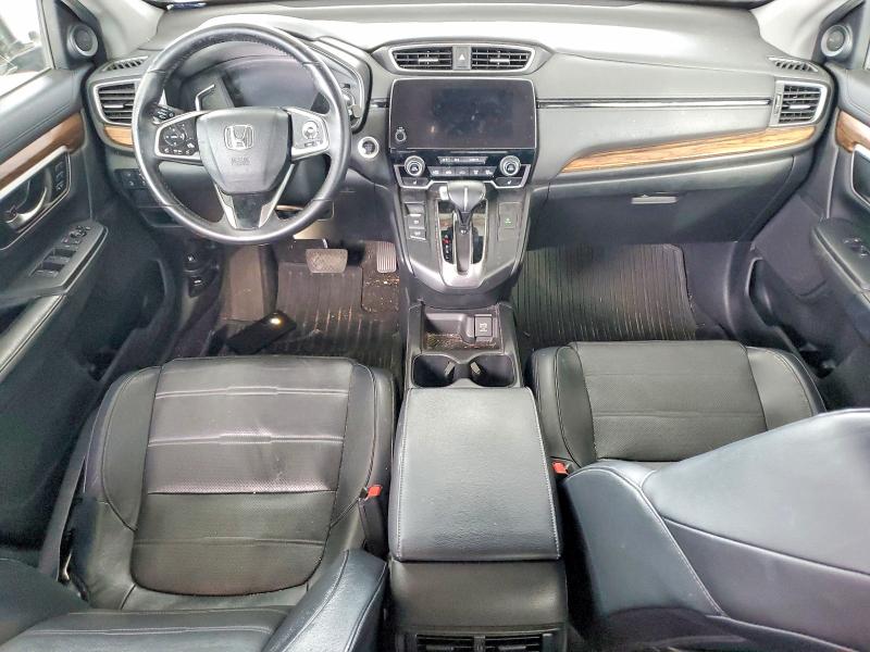 Photo 8 from auction – 2017 HONDA CR-V with VIN 7FARW1H87HE017563