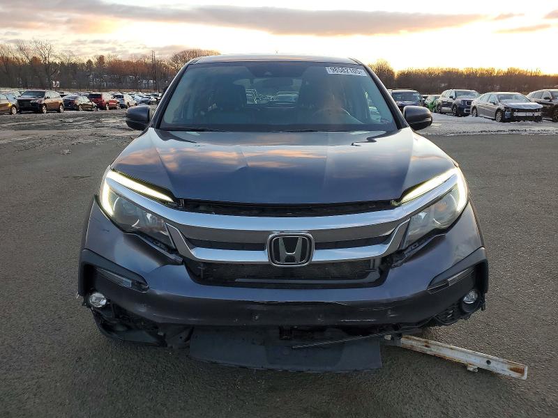 Photo 5 from auction – 2021 HONDA PILOT EX with VIN 5FNYF6H37MB081153