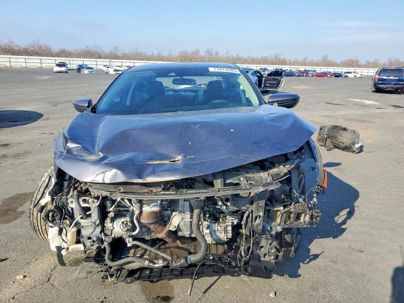 Photo 5 from auction – 2019 HONDA CIVIC with VIN 2HGFC2F61KH584577