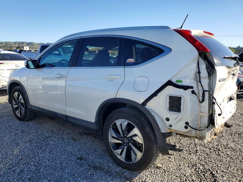 Photo 2 from auction – 2016 HONDA CR-V TOURI with VIN 5J6RM3H99GL016717