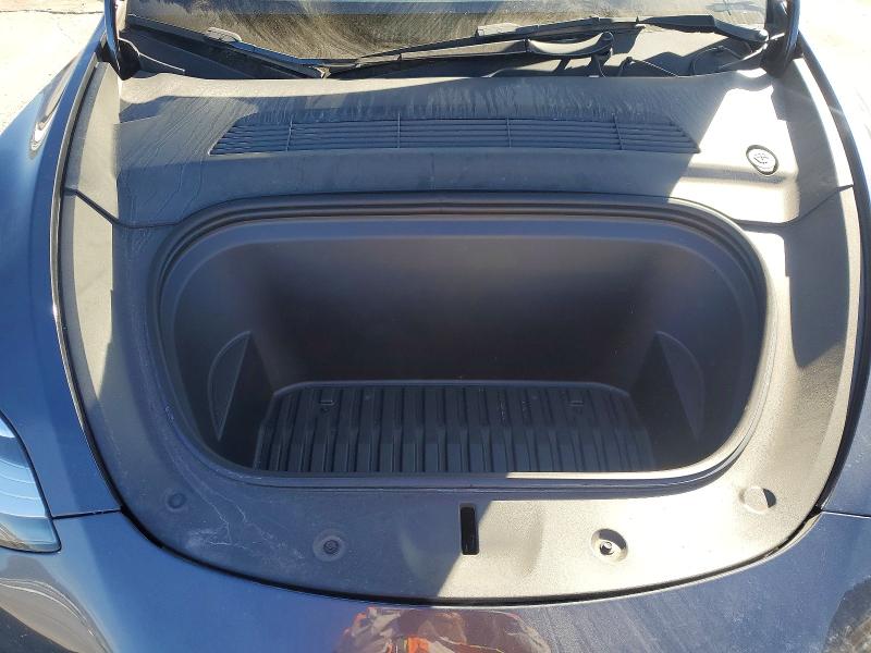 Photo 11 from auction – 2022 TESLA MODEL Y with VIN 7SAYGAEE6NF576535