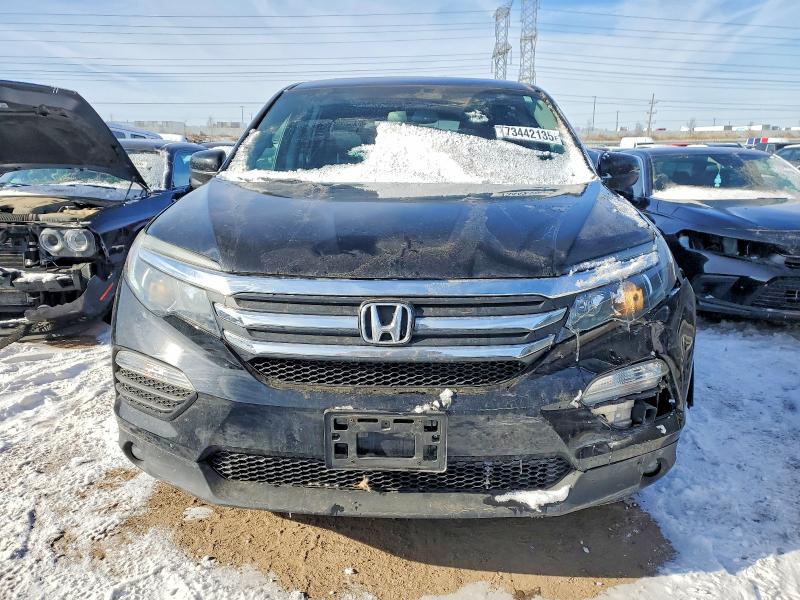 Photo 5 from auction – 2017 HONDA PILOT EXL with VIN 5FNYF6H55HB081059