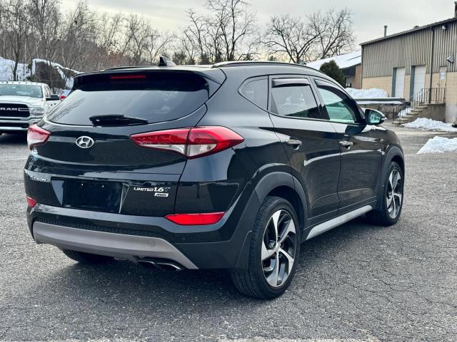 Photo 4 from auction – 2018 HYUNDAI TUCSON VAL with VIN KM8J3CA2XJU627436