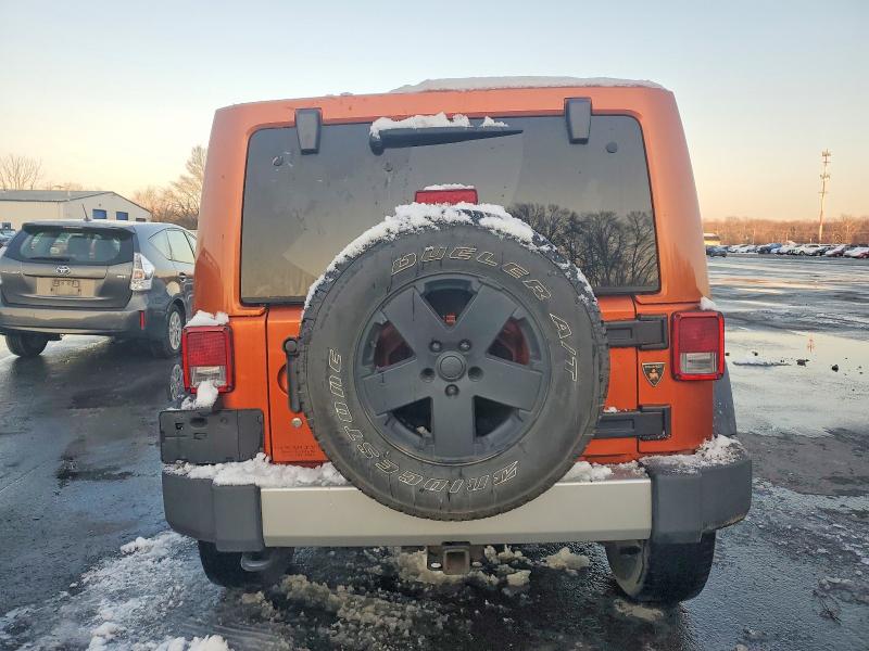 Photo 6 from auction – 2011 JEEP WRANGLER U with VIN 1J4HA5H1XBL572649