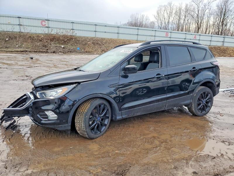 FORD ESCAPE 2017 with VIN 1FMCU9GD4HUE70661 - Photo from auction