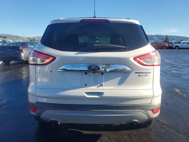 Photo 6 from auction – 2014 FORD ESCAPE TIT with VIN 1FMCU9JX4EUA30325