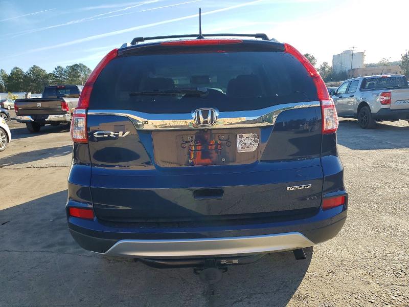 Photo 6 from auction – 2015 HONDA CR-V TOURI with VIN 5J6RM3H94FL022116