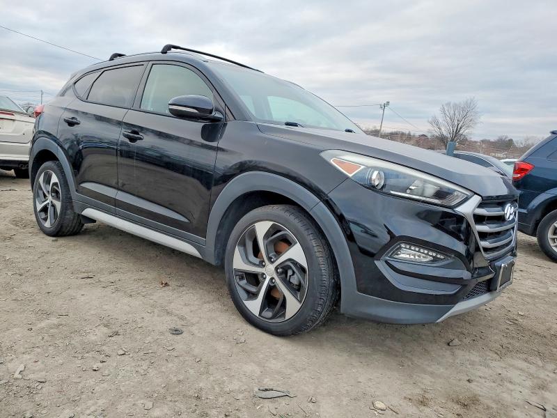 Photo 4 from auction – 2017 HYUNDAI TUCSON with VIN KM8J33A29HU478365