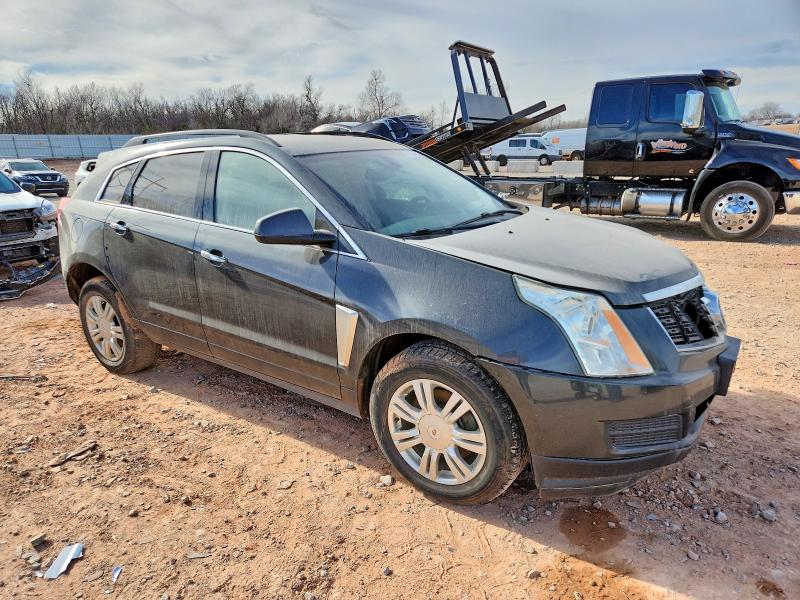 CADILLAC SRX 2014 with VIN 3GYFNAE34ES563728 - Photo from auction