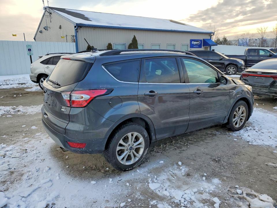 Foto 3 de la subasta – 2018 FORD ESCAPE con VIN 1FMCU9HD6JUB39424