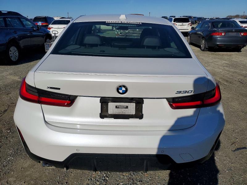 Photo 6 from auction – 2023 BMW 330XI with VIN 3MW89FF05P8C84600