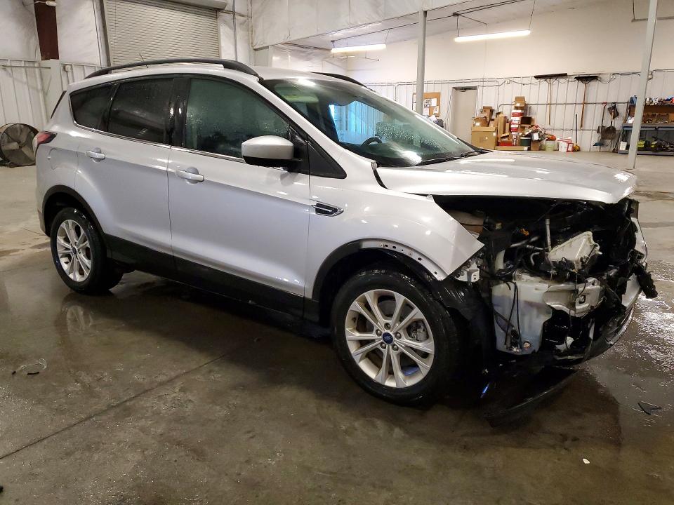 Photo 4 from auction – 2017 FORD ESCAPE with VIN 1FMCU9G96HUA40187