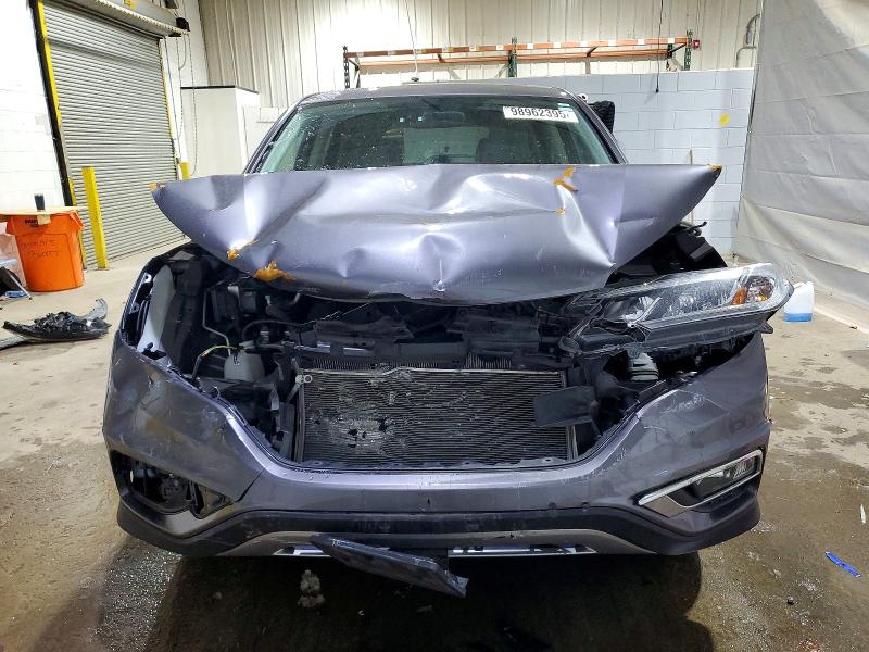 Photo 5 from auction – 2015 HONDA CR-V EX with VIN 2HKRM4H57FH619600
