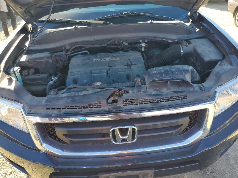 Photo 11 from auction – 2011 HONDA RIDGELINE with VIN 5FPYK1F28BB009570