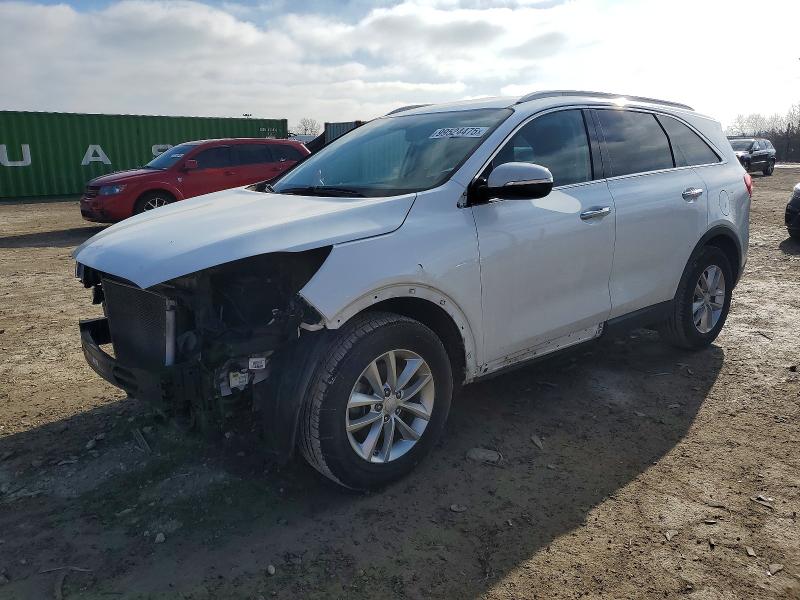 KIA SORENTO LX 2016 with VIN 5XYPG4A30GG107077 - Photo from auction