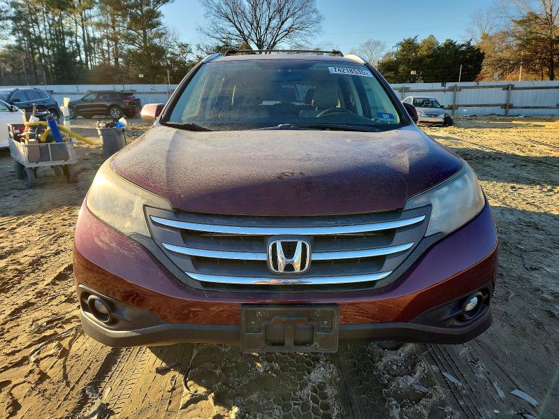 Photo 5 from auction – 2014 HONDA CR-V with VIN 5J6RM4H79EL043322