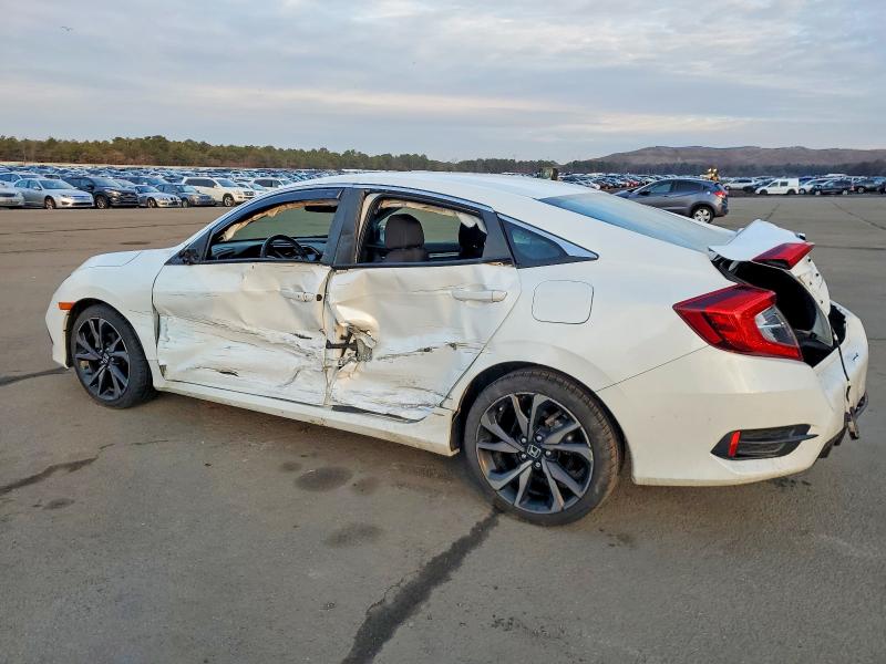 Photo 2 from auction – 2021 HONDA CIVIC with VIN 2HGFC2F85MH558570