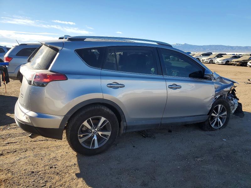 Photo 3 from auction – 2016 TOYOTA RAV4 with VIN 2T3RFREV2GW451970