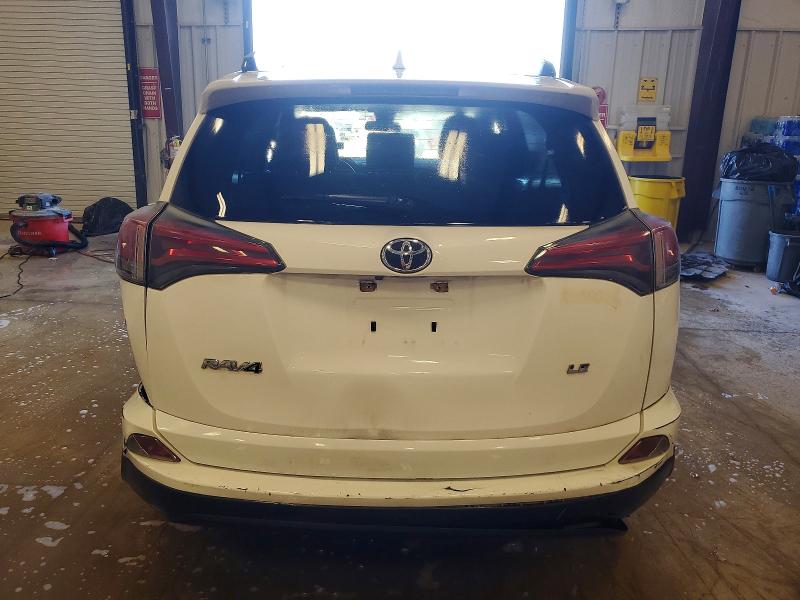 Photo 6 from auction – 2017 TOYOTA RAV4 LE with VIN JTMZFREV6HJ129882