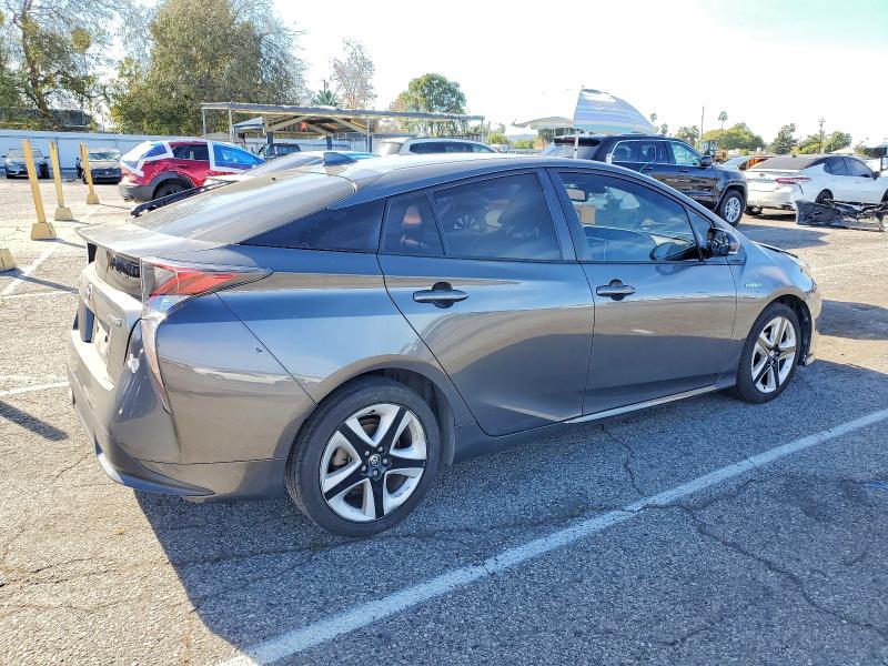 Photo 3 from auction – 2016 TOYOTA PRIUS with VIN JTDKARFU7G3026740