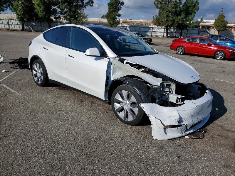 Photo 4 from auction – 2024 TESLA MODEL Y with VIN 7SAYGDEE3RA261633