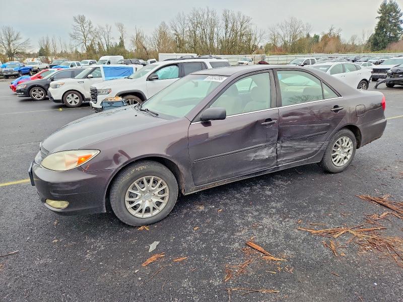 Photo 1 from auction – 2002 TOYOTA CAMRY LE with VIN JTDBE32K320089219