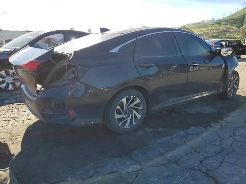 Photo 3 from auction – 2018 HONDA CIVIC EX with VIN 2HGFC2F73JH576049