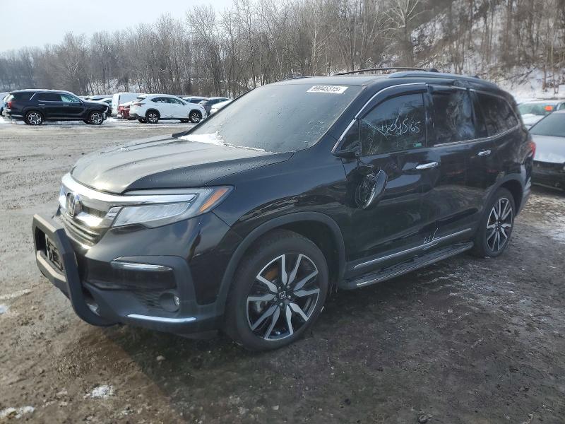 HONDA PILOT ELIT 2019 with VIN 5FNYF6H09KB055446 - Photo from auction