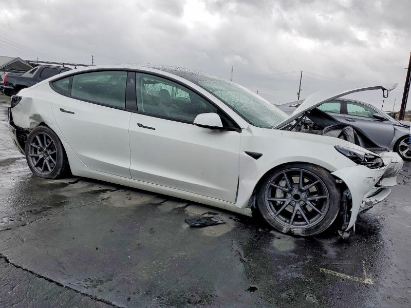 Photo 4 from auction – 2023 TESLA MODEL 3 with VIN 5YJ3E1EA5PF555527