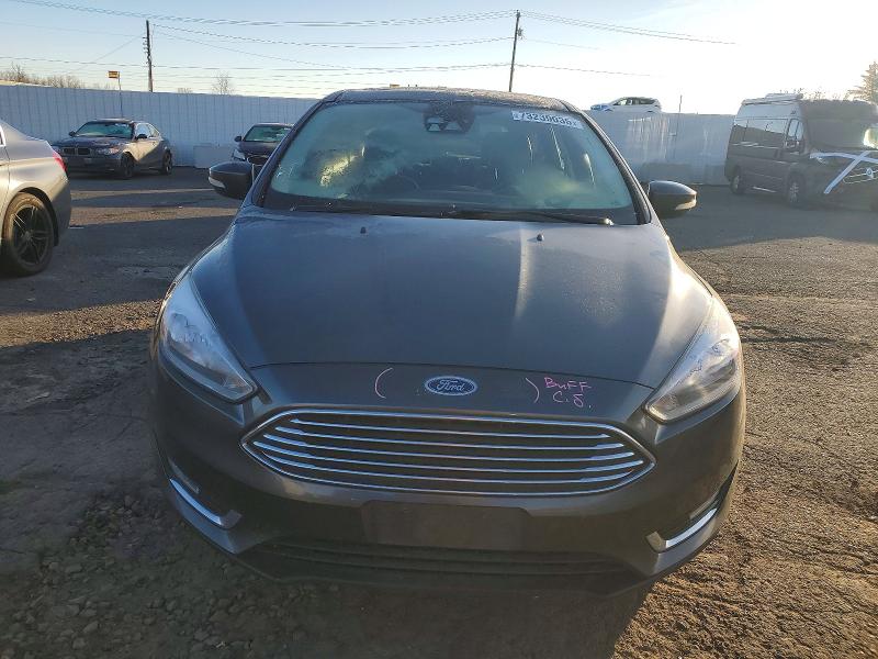 Photo 5 from auction – 2018 FORD FOCUS TITA with VIN 1FADP3N21JL211917