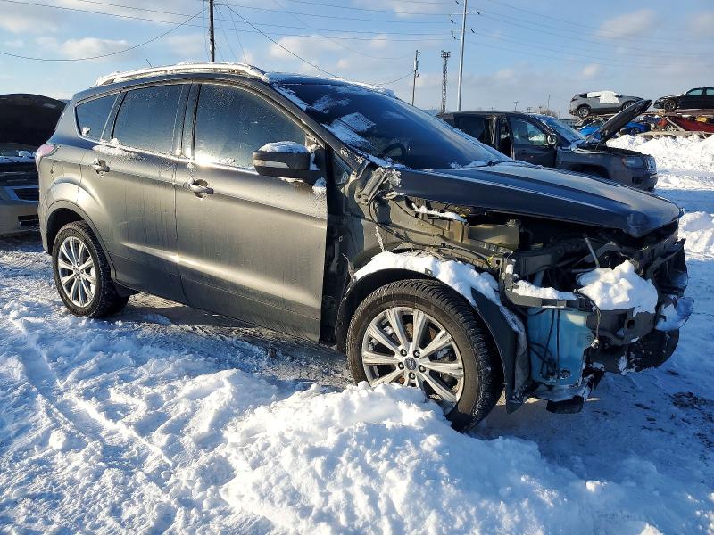 Photo 4 from auction – 2017 FORD ESCAPE TIT with VIN 1FMCU9J90HUB15054