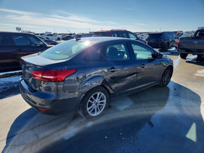 Photo 3 from auction – 2016 FORD FOCUS with VIN 1FADP3F2XGL378686