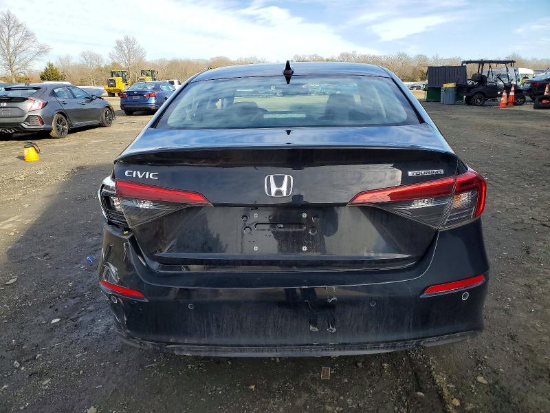 Photo 6 from auction – 2023 HONDA CIVIC TOUR with VIN 2HGFE1F91PH306056