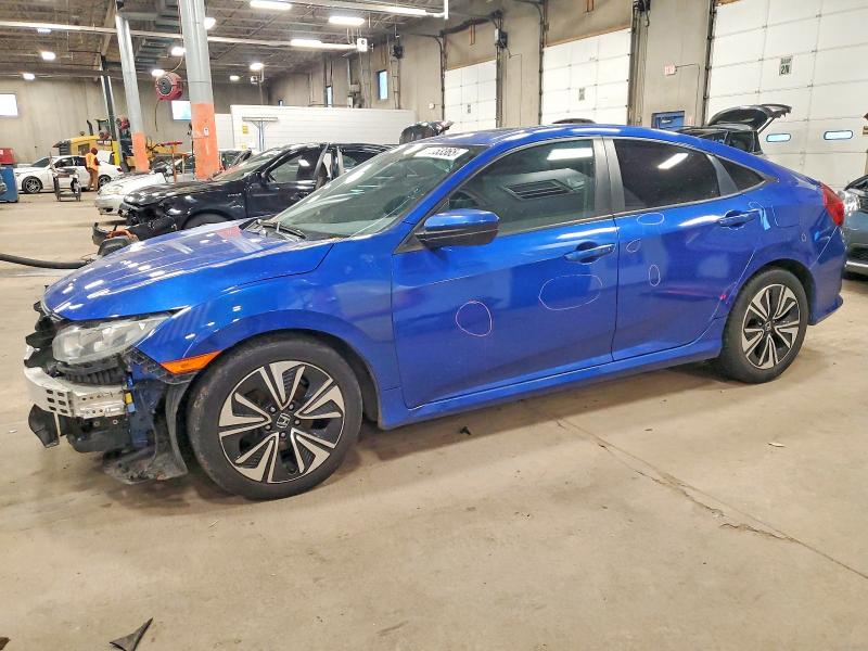 HONDA CIVIC EXL 2017 with VIN 19XFC1F76HE010403 - Photo from auction